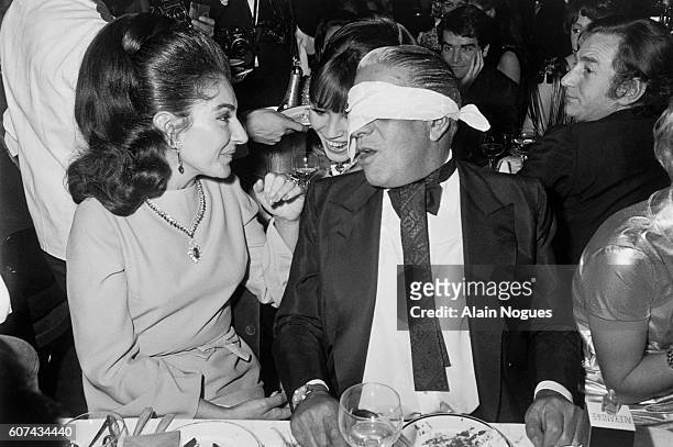 Celebrated American operatic soprano, Maria Callas, and Greek business tycoon, Aristotle Onassis, enjoy an evening out at the Lido in Paris. Their...