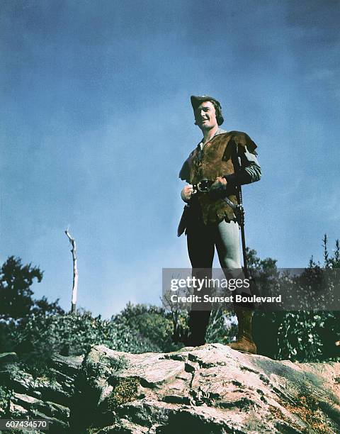 Australian actor Errol Flynn on the set of The Adventures of Robin Hood, directed by Michael Curtiz and William Keighley.