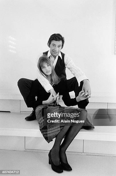 French composer Serge Gainsbourg and British actress Jane Birkin present the latest Cacharel fashions.