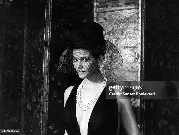 Italian actress Claudia Cardinale on the set of Il magnifico cornuto , based on the play by Fernand Crommelynck and directed by Antonio Pietrangeli.