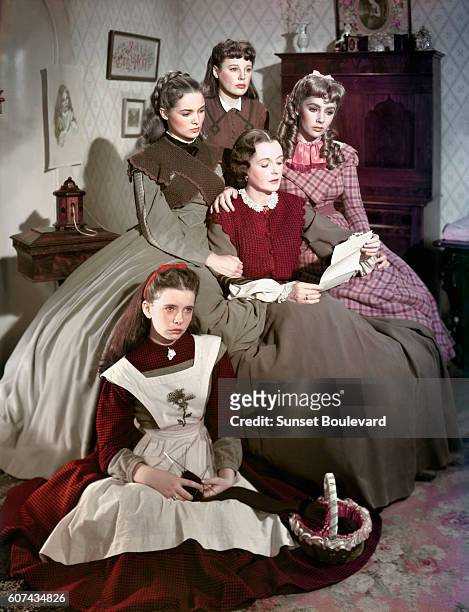 Actresses Margaret O'Brien, Janet Leigh, June Allyson, Elyzabeth Taylor and Mary Astor on the set of Little Women, based on the novel by Louisa May...