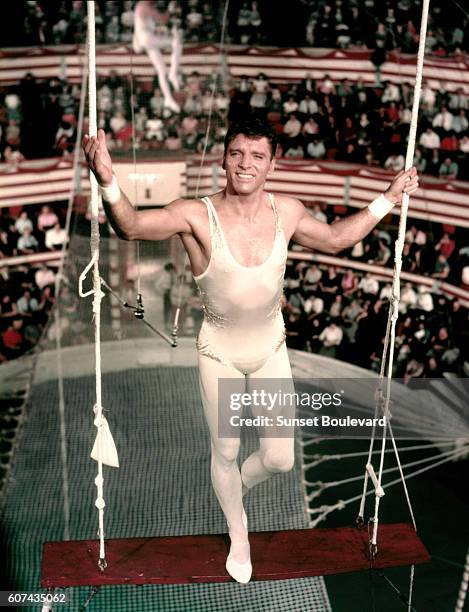 American actor Burt Lancaster on the set of Trapeze, based on the novel by Max Catto and directed by Carol Reed.