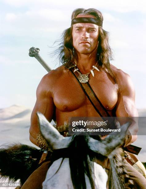 Austrian-born American actor Arnold Schwarzenegger on the set of Conan the Barbarian, directed by John Milius.