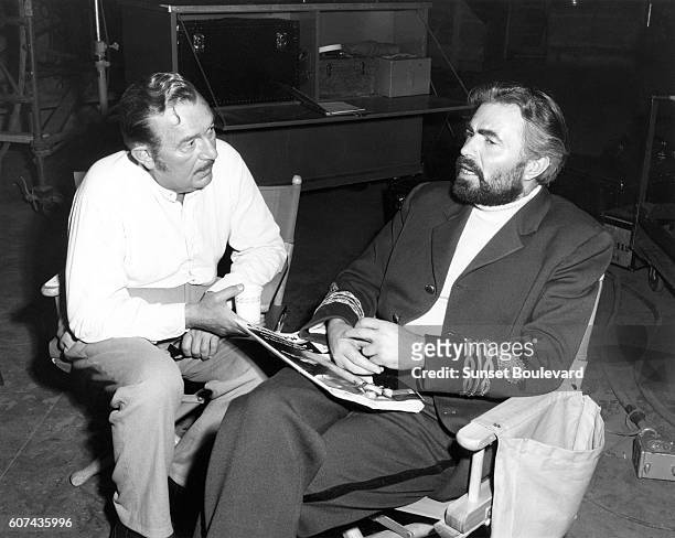 American actor of Austro-Hungarian origin Paul Lukas and British actor James Mason on the set of 20000 Leagues Under the Sea, directed by Richard...