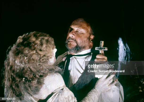 British actors Janine Duvitski and Donald Pleasance on the set of Dracula, based on the play by Hamilton Deane, and directed by John Badham.