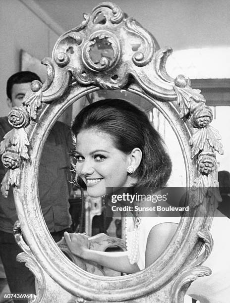 Italian actress Claudia Cardinale on the set of Il magnifico cornuto , based on the play by Fernand Crommelynck and directed by Antonio Pietrangeli.