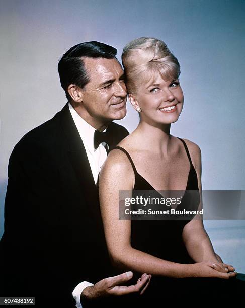 American actors Cary Grant and Doris Day on the set of That Touch of Mink, directed by Delbert Mann.