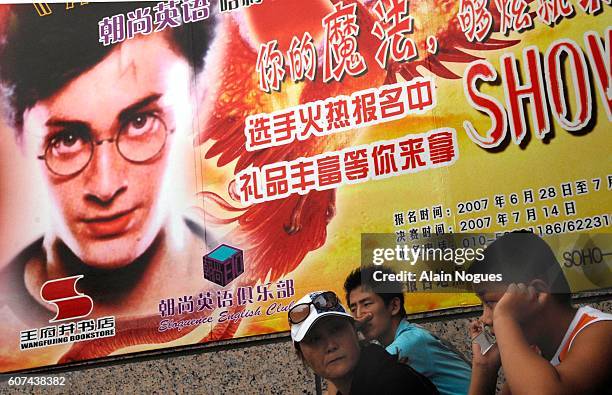 Movie poster for the new Harry Potter movie hangs in the entrance of the Wangfujing Bookstore. As evidence of the economic boom in China, Avenue...