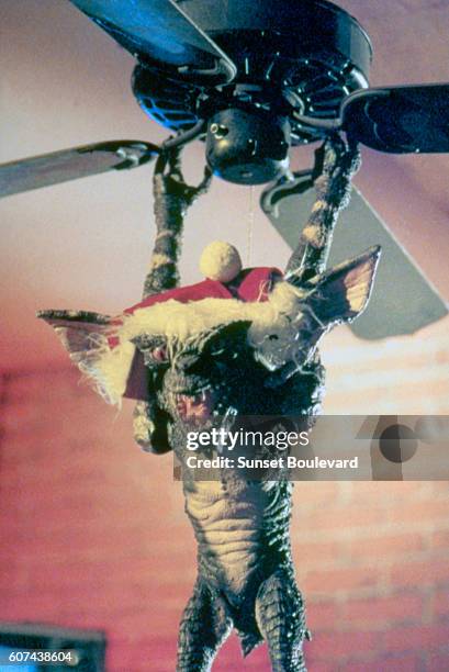 On the set of Gremlins, directed by Joe Dante.