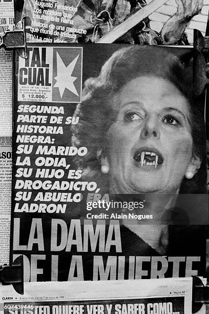 Portrait of British Prime Minister Margaret Thatcher with added fangs to make her look like a vampire, on the cover of an Argentine newspaper during...