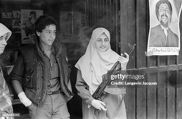 Sunni Mourabioun soldier holds her position in Beirut, Lebanon, shortly before the 1984 withdrawal of the Multinational Forces. In 1975, Lebanon fell...