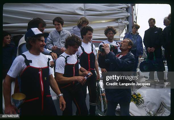 Sailors Jean le Cam, Patrick Morvan, Serge Madec, and Marc Guillemot, winners of the Atlantic Record, with former champion Eric Tabarly.