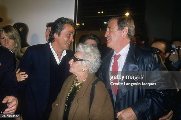 Jean-Paul Belmondo and his mother open a sculpture exhibition for his father Paul Belmondo's sculpture at Forum des Halles in Paris on November 7,...