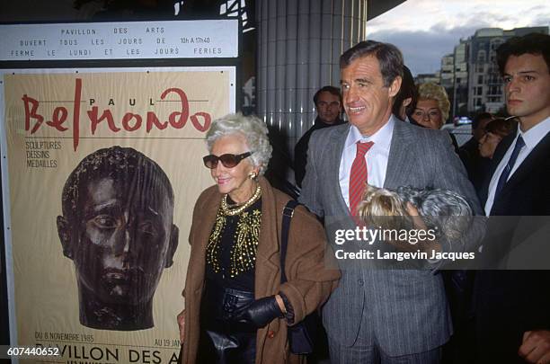 Jean-Paul Belmondo and his mother open a sculpture exhibition for his father Paul Belmondo's sculpture at Forum des Halles in Paris on November 7,...