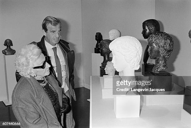 Jean-Paul Belmondo and his mother open open a sculpture exhibition for his father Paul Belmondo at Forum des Halles in Paris on November 7, 1985....