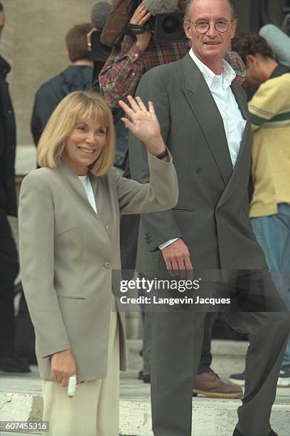 Mireille Darc arriving with her friend Pascal Desperez.