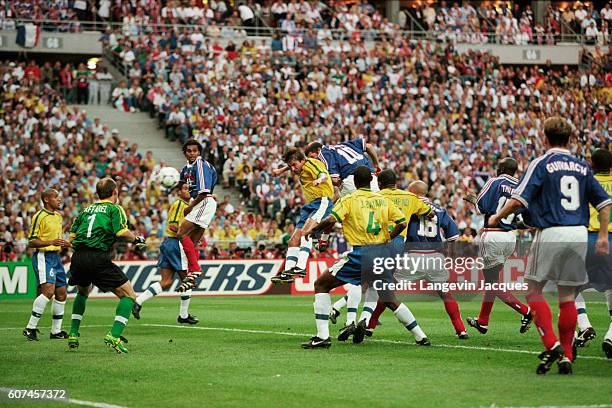 France's Zinedine Zidane scoring the first goal during the 1998 FIFA World Cup final against Brazil. France won 3-0. | Location: Saint-Denis, France.