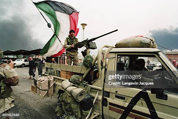 Kuwaiti citizens greet coalition forces as the troops move towards Kuwait City during the Persian Gulf War. In August of 1990, Iraqi president Saddam...