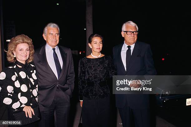 British-born American actor Cary Grant, his wife Barbara Harris, American actor John Forsythe and his wife Julie Warren.
