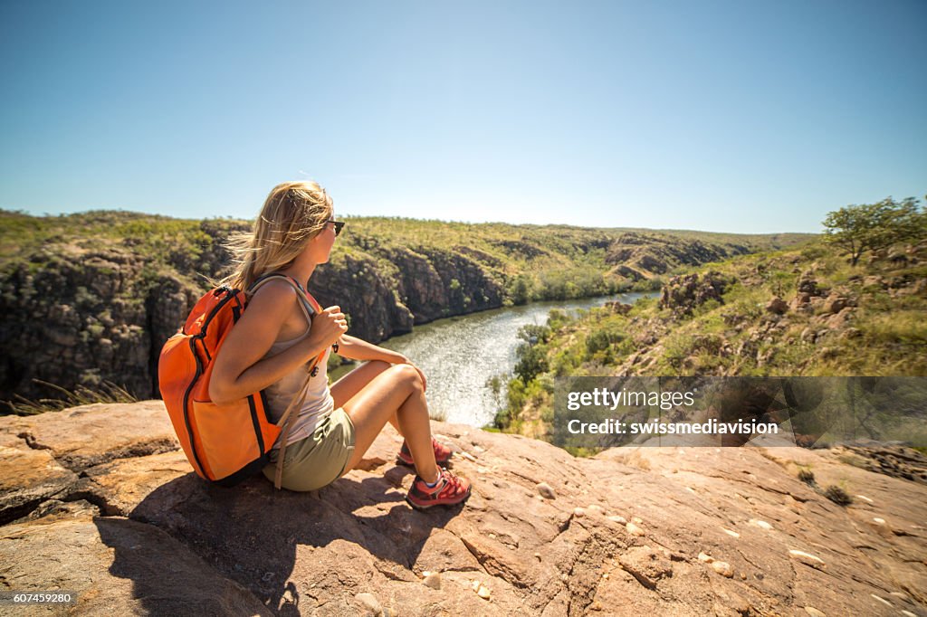 Hiker contemplating spectacular landscape