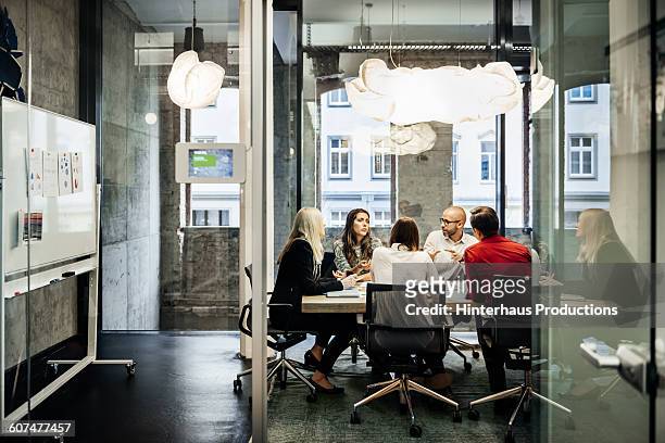 business meeting in a modern office. - konferenzraum stock-fotos und bilder