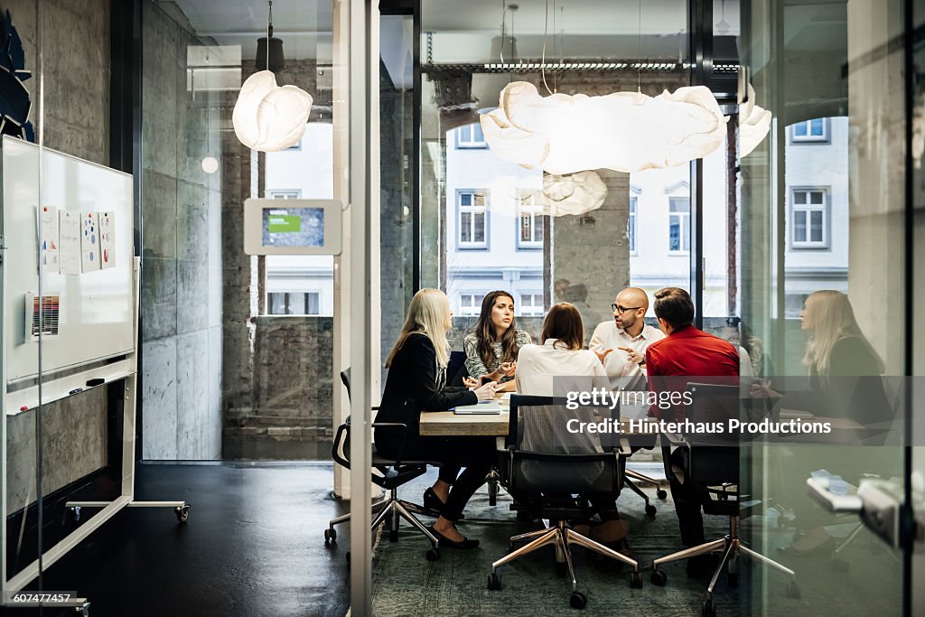 Business meeting in a modern office.