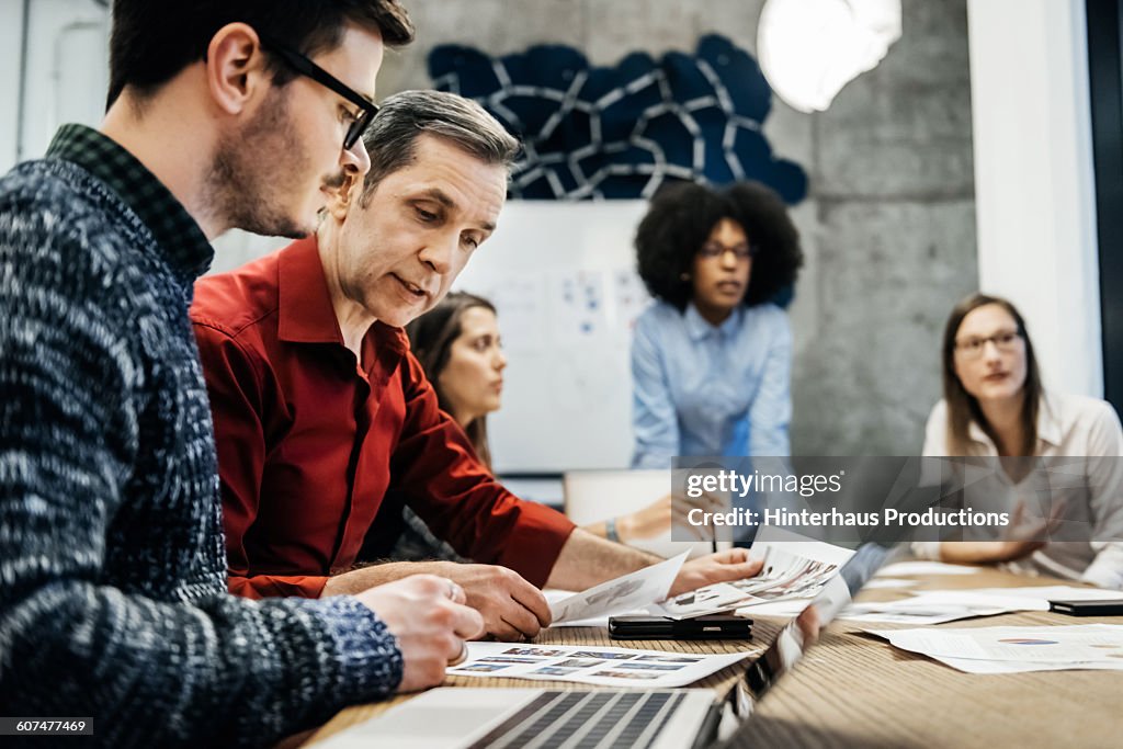 Business meeting in modern office.