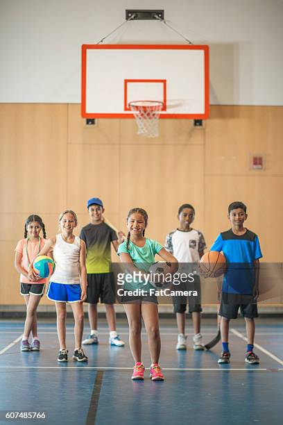students in the gym - physical education stock pictures, royalty-free photos & images