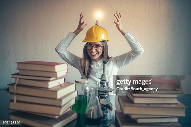crazy female scientist having an idea - brain in a jar stock pictures, royalty-free photos & images