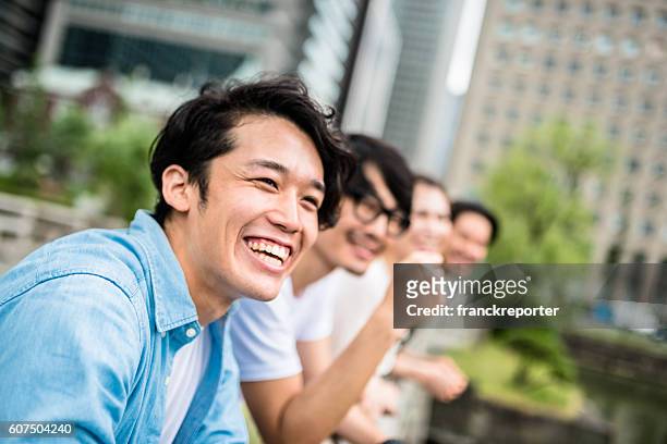 japanese friends happiness all together in tokyo - japanese ethnicity stock pictures, royalty-free photos & images