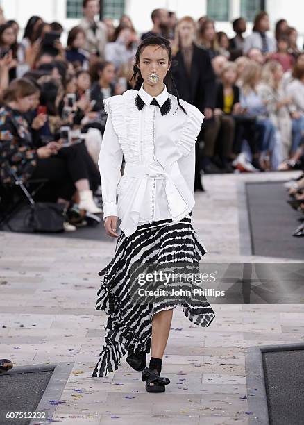 Model walks the runway at the Preen by Thornton Bregazzi show during London Fashion Week Spring/Summer collections 2017 on September 18, 2016 in...