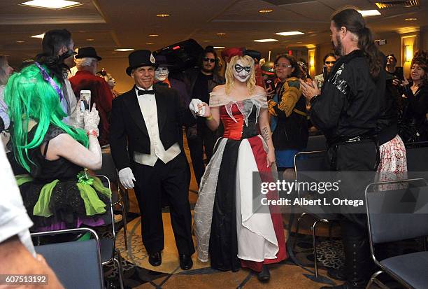 Cosplayers Zoe Oliva dressed as Harley Quinn marries Jesse Oliva dressed as The Joker at the Long Beach Comic Con held at Long Beach Convention...