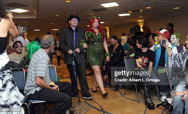 Cosplayers Zoe Oliva dressed as Harley Quinn marries Jesse Oliva dressed as The Joker at the Long Beach Comic Con held at Long Beach Convention...