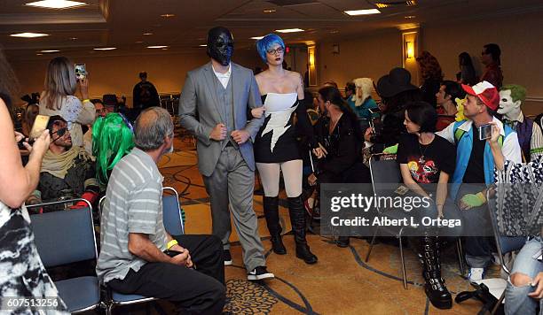 Cosplayers Zoe Oliva dressed as Harley Quinn marries Jesse Oliva dressed as The Joker at the Long Beach Comic Con held at Long Beach Convention...