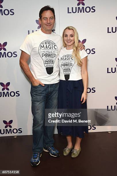Jason Isaacs and Evanna Lynch supporting the Lumos launch of its 'Be the Light' T-shirt to raise funds for its work to help end the...