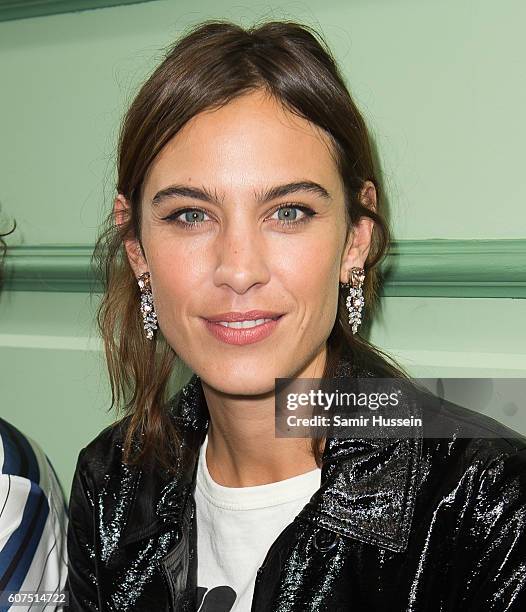 Alexa Chung attends the JW Anderson show during London Fashion Week Spring/Summer collections 2016/2017 on September 17, 2016 in London, United...