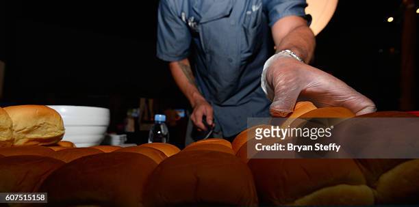 Martin's Famous Potato Rolls are sliced during the Las Vegas Food & Wine Festival at the SLS Las Vegas Hotel on September 17, 2016 in Las Vegas,...