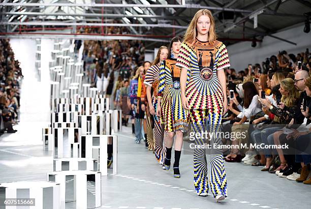 Models walk the runway at the Mary Katrantzou show during London Fashion Week Spring/Summer collections 2017 on September 18, 2016 in London, United...