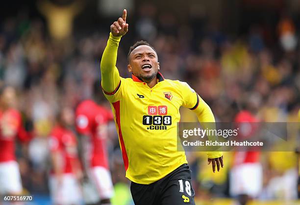 Juan Camilo Zuniga of Watford celebrates scoring his sides second goal during the Premier League match between Watford and Manchester United at...