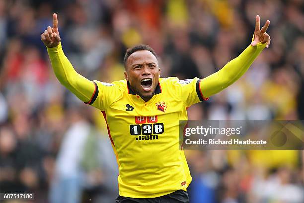 Juan Camilo Zuniga of Watford celebrates scoring his sides second goal with his team mates during the Premier League match between Watford and...