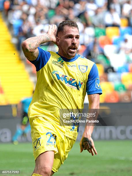 Fabrizio Cacciatore of AC ChievoVerona celebrates after scoring his team's second goal during the Serie A match between Udinese Calcio and AC...