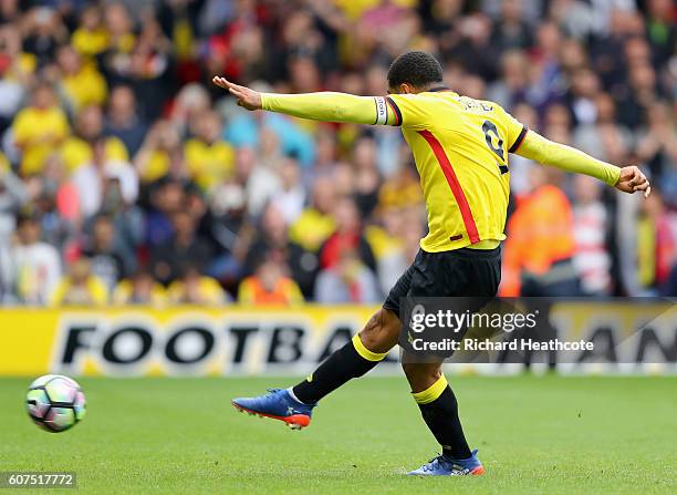 Troy Deeney of Watford scores his sides third goal during the Premier League match between Watford and Manchester United at Vicarage Road on...