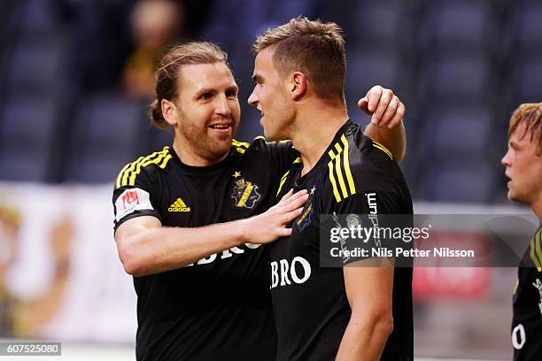 Nils-Eric Johansson of AIK celebrates with Eero Markkanen of AIK who scores the opening goal to 1-0 during the Allsvenskan match between AIK and...
