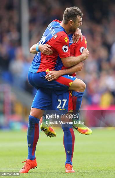James McArthur of Crystal Palace celebrates scoring his sides third goal with Damien Delaney of Crystal Palace during the Premier League match...