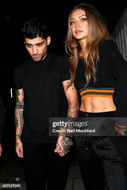 Zayn Malik and Gigi Hadid seen leaving Versus Versace Show on Day 2 of London Fashion Week Spring/Summer collections 2017 on September 17, 2016 in...