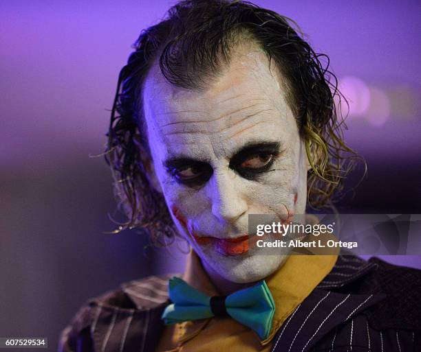 Cosplayers Zoe Oliva dressed as Harley Quinn marries Jesse Oliva dressed as The Joker at the Long Beach Comic Con held at Long Beach Convention...