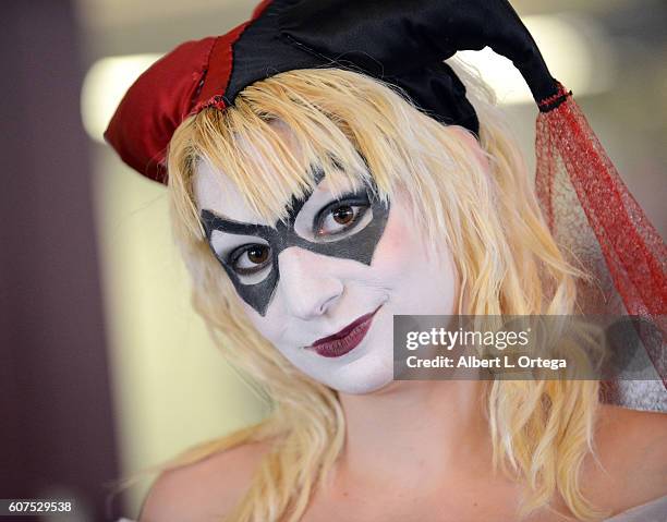 Cosplayers Zoe Oliva dressed as Harley Quinn marries Jesse Oliva dressed as The Joker at the Long Beach Comic Con held at Long Beach Convention...