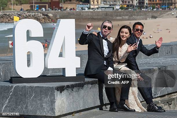 Chinese film director Feng Xiaogang , Chinese actress Fan Bingbing and Chinese producer Wang Zhonglei pose for a photocall after the screening of...
