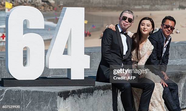 Chinese film director Feng Xiaogang , Chinese actress Fan Bingbing and Chinese producer Wang Zhonglei pose for a photocall after the screening of...