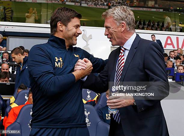 Tottenham Hotspur's Argentinian head coach Mauricio Pochettino greets Sunderland's Scottish manager David Moyes ahead of the English Premier League...